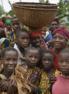 A group of happy children with one carrying a larg 2024 07 11 02 40 27 utc.webp